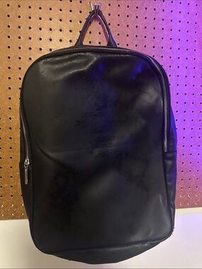 Calvin Klein Black Leather Backpack with Silver Zippers